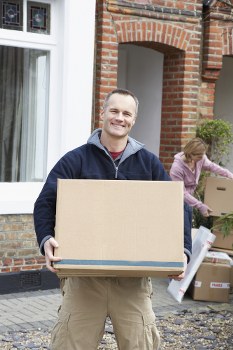 Office removals planning in Kew with packed boxes and office furniture
