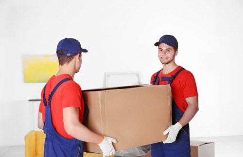 Man and van team preparing a booking and moving equipment