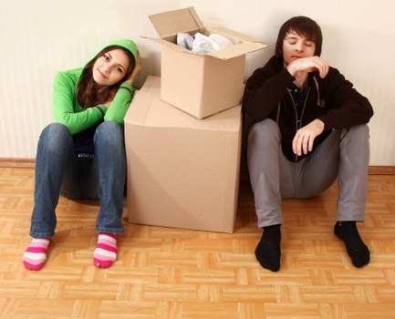 Professional team collecting unwanted furniture from a Kew home
