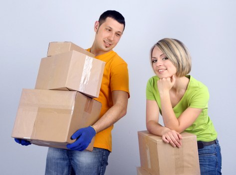 Business furniture and equipment being prepared for a move in Kew