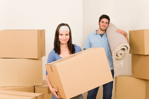 Professional team handling office furniture and equipment during a Kew relocation