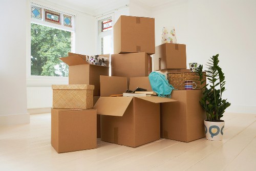Furniture being moved from a Kew property with narrow access