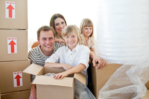 Boxes and household items ready for a local house removal in Kew