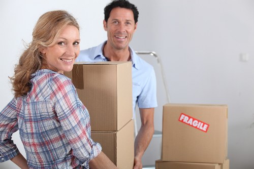 Office relocation equipment and boxes prepared for a business move in Kew